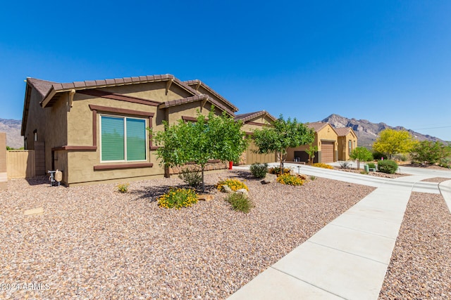 view of home's exterior featuring a mountain view