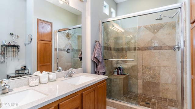 bathroom with vanity and an enclosed shower