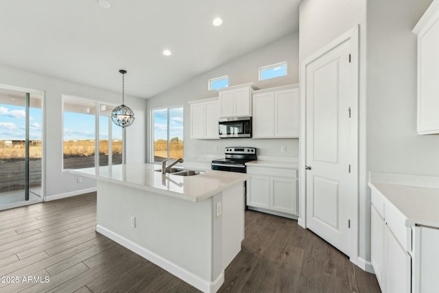 22343 S Manzanilla Rd, Buckeye, AZ 85326 - kitchen featuring appliances with stainless steel finishes, white cabinetry, light countertops, recessed lighting, and dark wood-style flooring