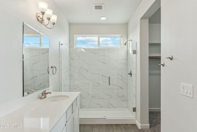 22343 S Manzanilla Rd, Buckeye, AZ 85326 - bathroom featuring vanity and a marble finish shower