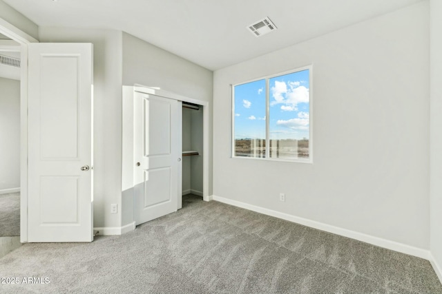 22343 S Manzanilla Rd, Buckeye, AZ 85326 - unfurnished bedroom featuring carpet flooring and a closet