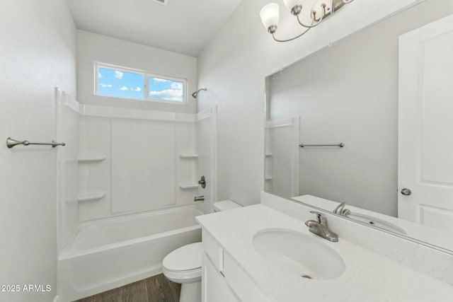 22343 S Manzanilla Rd, Buckeye, AZ 85326 - bathroom with vanity, tub / shower combination, and wood finished floors