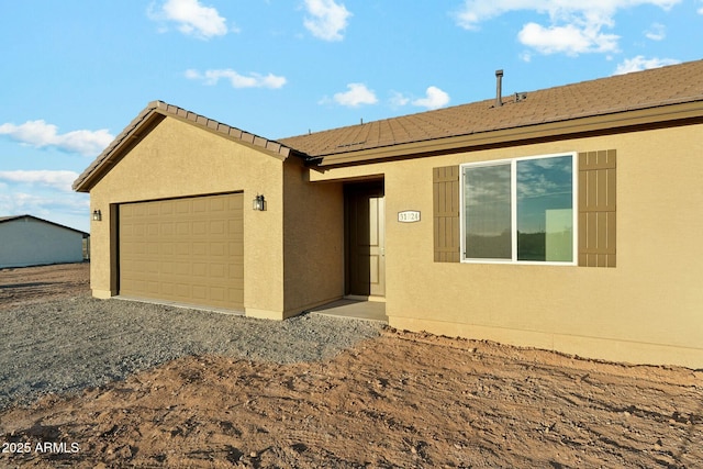 22343 S Manzanilla Rd, Buckeye, AZ 85326 - ranch-style home with stucco siding, a garage, and a tile roof