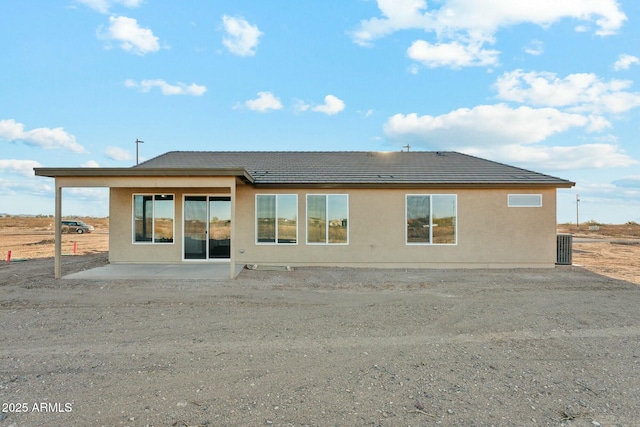 22343 S Manzanilla Rd, Buckeye, AZ 85326 - rear view of house featuring a patio area, a tiled roof, and stucco siding