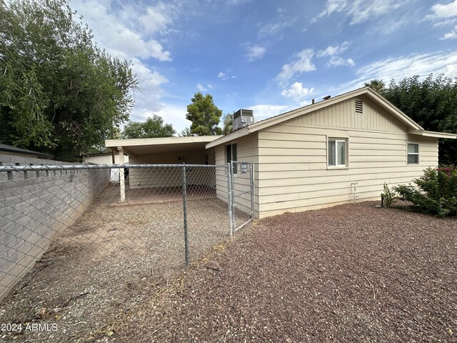 269 Sylvan Rd, Wickenburg, AZ 85390 - view of side of home with a gate and fence