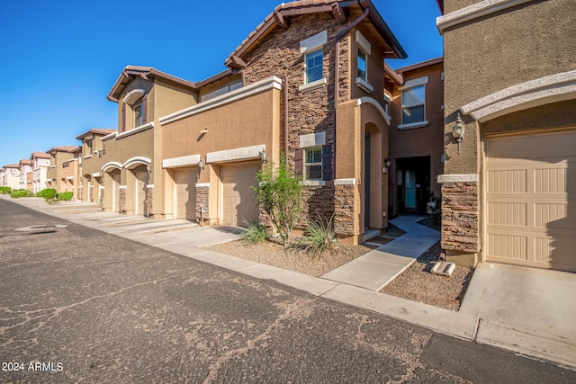 view of front of property with a garage