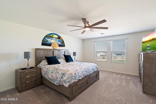 bedroom with light colored carpet and ceiling fan