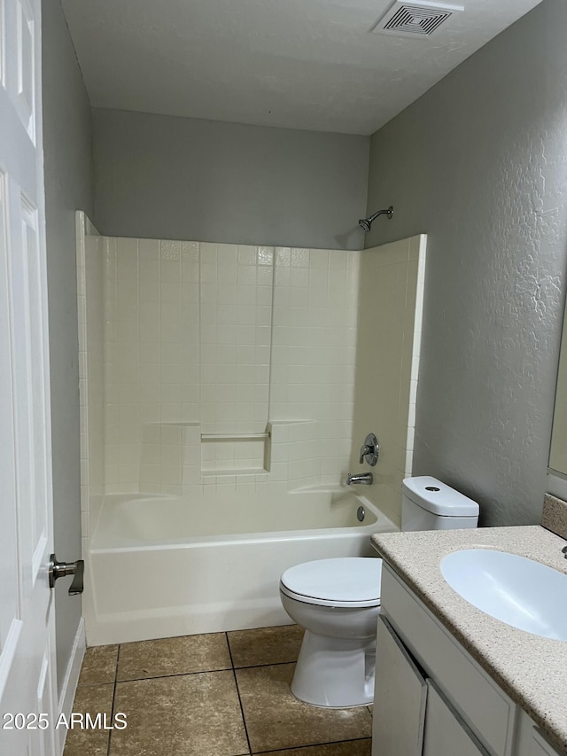 full bathroom with visible vents, toilet, shower / bathtub combination, tile patterned floors, and vanity