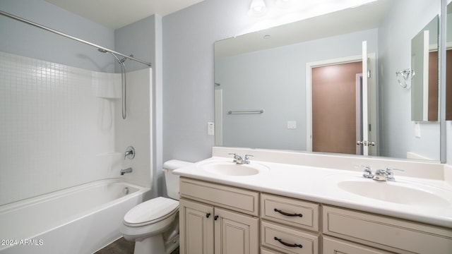 full bathroom featuring vanity, toilet, and bathtub / shower combination