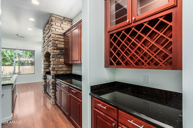 wine area featuring light hardwood / wood-style flooring