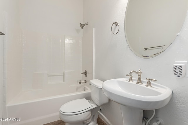 full bathroom featuring toilet, sink, and shower / bathtub combination