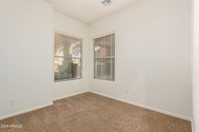 empty room with carpet floors