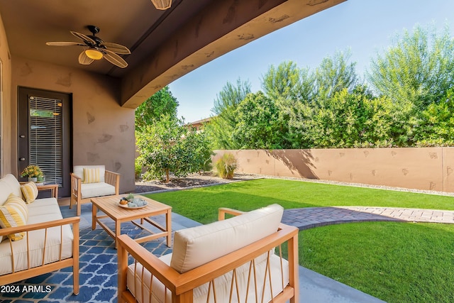 view of patio with ceiling fan and outdoor lounge area