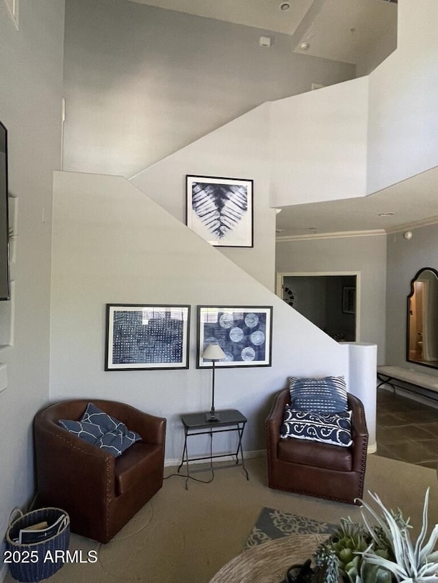 living area with carpet floors and baseboards