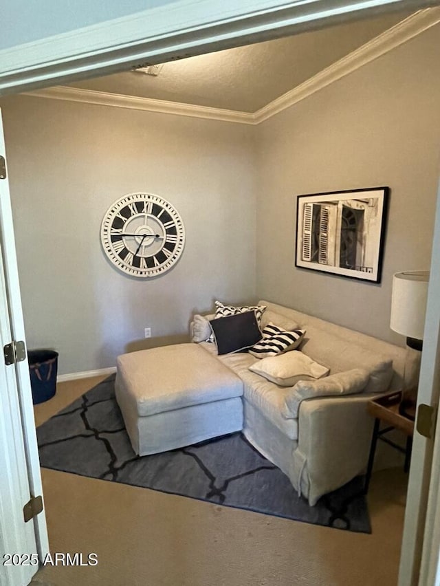 carpeted living area featuring ornamental molding