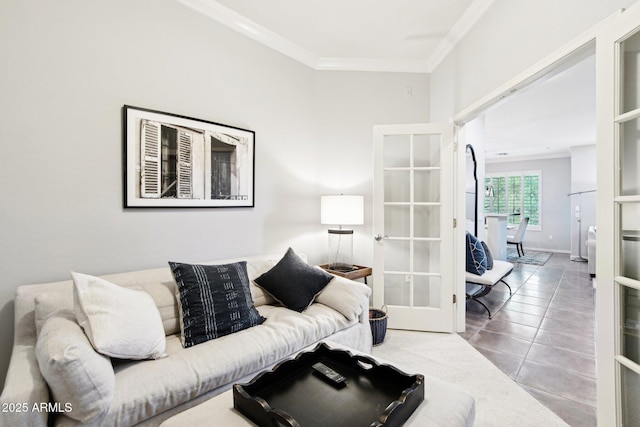 living room featuring french doors, ornamental molding, and tile patterned floors