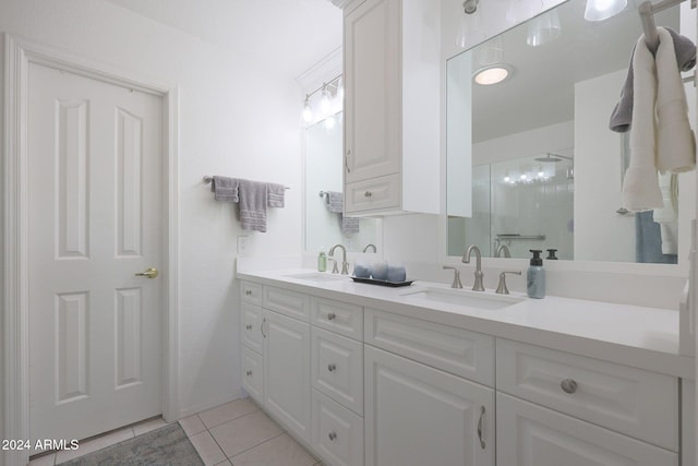 bathroom featuring vanity, tile patterned floors, and an enclosed shower