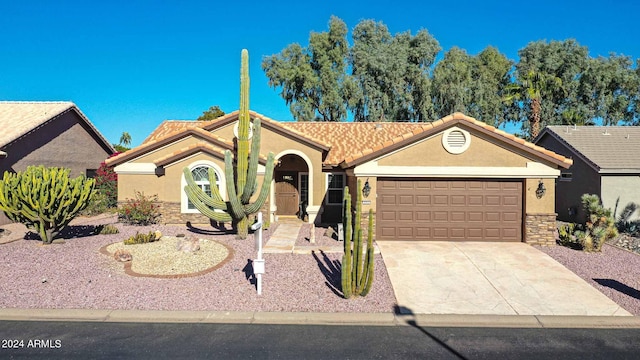 view of front of home featuring a garage