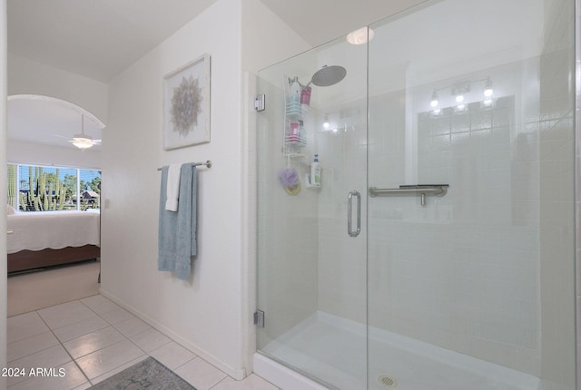 bathroom with tile patterned floors and an enclosed shower