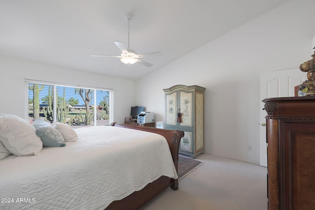 carpeted bedroom with vaulted ceiling and ceiling fan