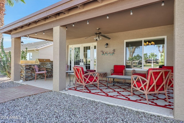 view of patio / terrace featuring ceiling fan and grilling area