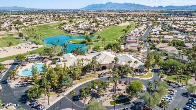 bird's eye view with a water and mountain view