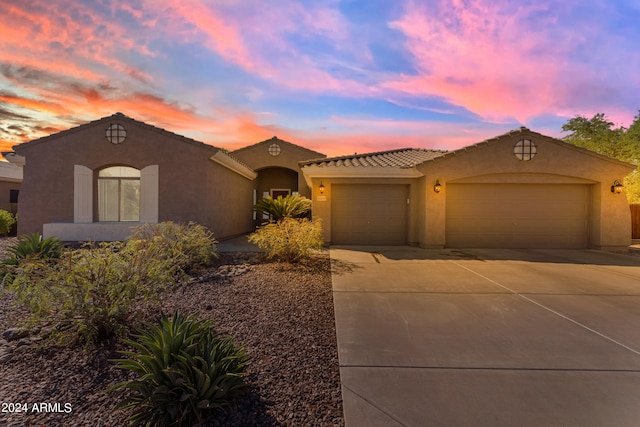 view of front of home with a garage