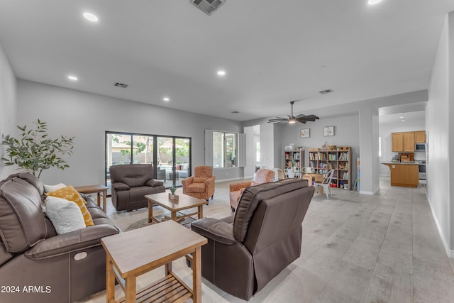 living room with ceiling fan