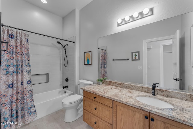 full bathroom with vanity, tile patterned floors, toilet, and shower / tub combo with curtain