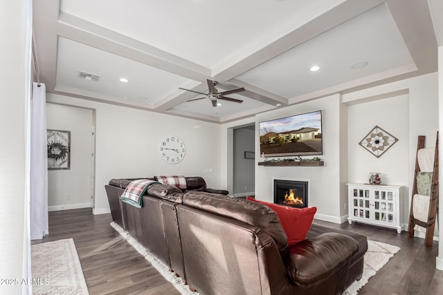 living room with beam ceiling, dark hardwood / wood-style floors, ceiling fan, and coffered ceiling