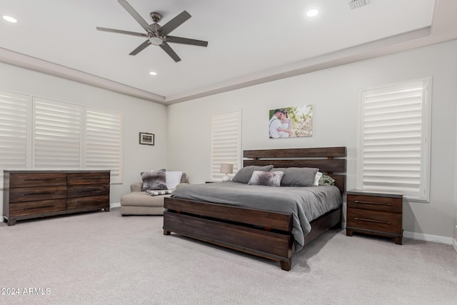 bedroom featuring ceiling fan and light colored carpet