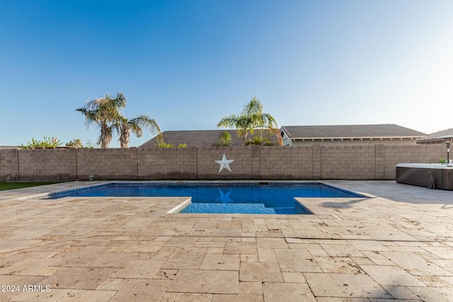 view of pool featuring a patio area