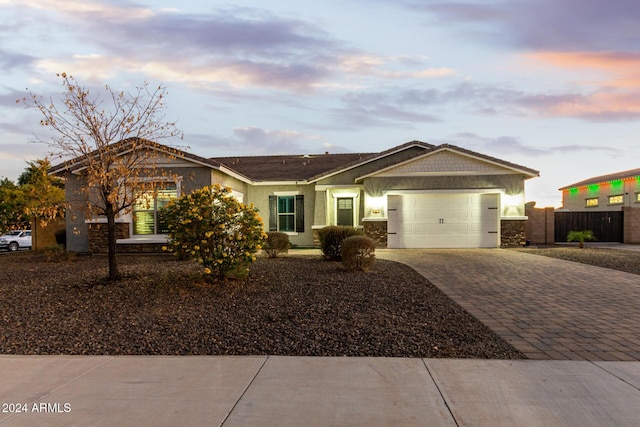 ranch-style home with a garage