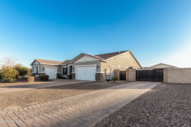 single story home featuring a garage