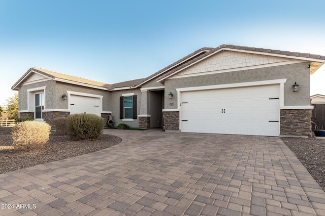 single story home with a garage