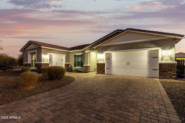 view of front of property featuring a garage