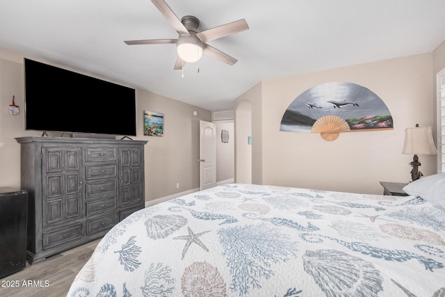 4262 E Sundance Ave, Gilbert, AZ 85297 - bedroom with a ceiling fan and wood finished floors