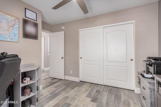 4262 E Sundance Ave, Gilbert, AZ 85297 - office space with baseboards, ceiling fan, and light wood-style flooring