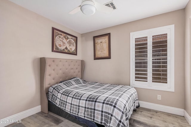 4262 E Sundance Ave, Gilbert, AZ 85297 - bedroom featuring baseboards, ceiling fan, wood finished floors, and visible vents