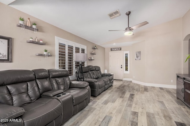4262 E Sundance Ave, Gilbert, AZ 85297 - living room with visible vents, lofted ceiling, baseboards, ceiling fan, and light wood-style flooring
