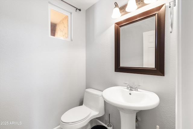 3025 E Fremont Rd, Phoenix, AZ 85042 - half bathroom featuring toilet and a sink