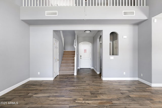 3025 E Fremont Rd, Phoenix, AZ 85042 - empty room with dark wood-type flooring and stairs