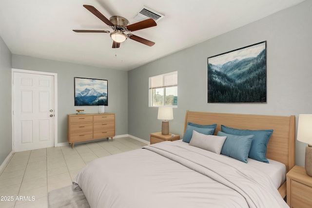 bedroom featuring light tile patterned floors and ceiling fan