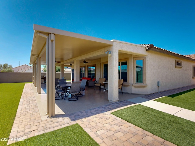 17547 W Gambit Trl, Surprise, AZ 85387 - view of patio / terrace featuring a ceiling fan