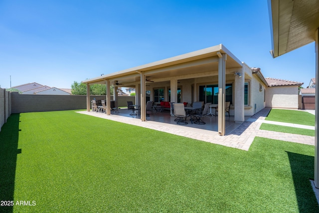 17547 W Gambit Trl, Surprise, AZ 85387 - view of yard featuring ceiling fan and a patio