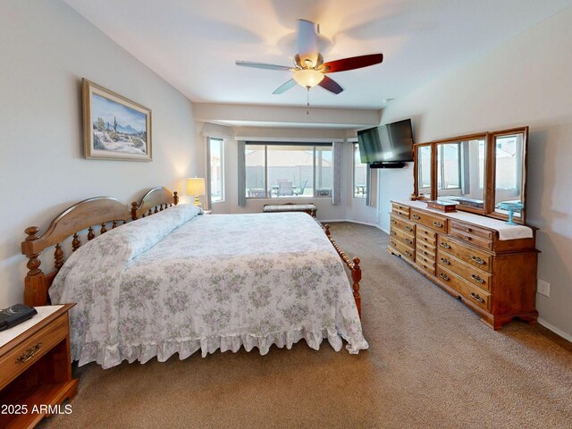 17547 W Gambit Trl, Surprise, AZ 85387 - bedroom with light carpet, baseboards, and a ceiling fan