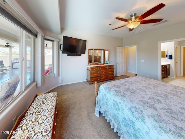 17547 W Gambit Trl, Surprise, AZ 85387 - bedroom with light colored carpet, baseboards, and ceiling fan