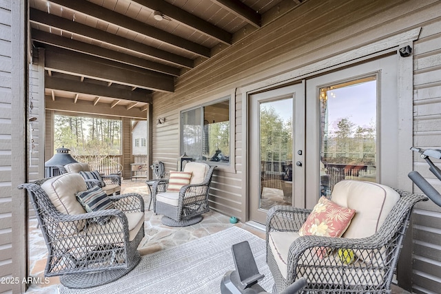 view of patio featuring an outdoor living space and french doors