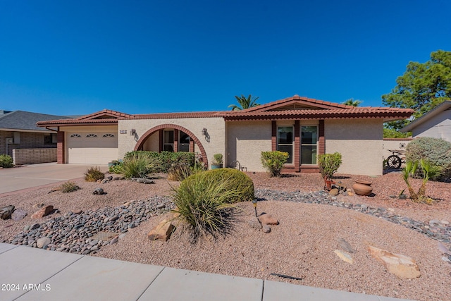 view of front of home with a garage