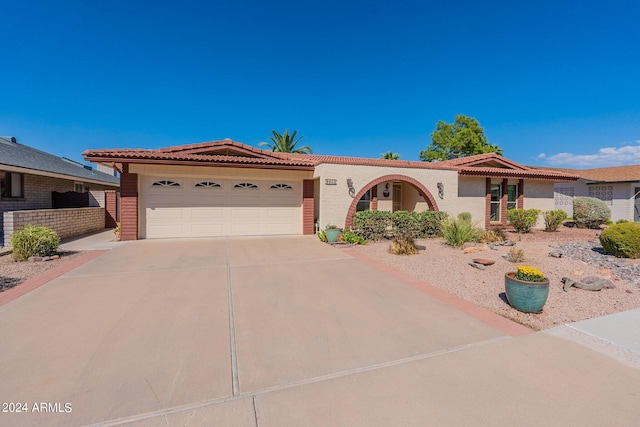 view of front of home with a garage